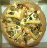 pizza with baby corn, black olives, jalapenos topping