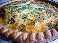quiche with carmelized onions, shallots, porcini mushrooms, emmental cheese and chives