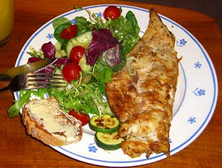 Grilled haddock with fresh herbs and cherry tomato