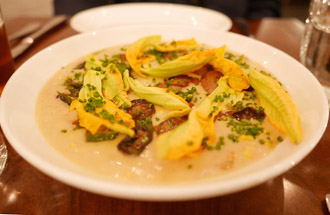 Risotto chanterelle and squash blossoms.