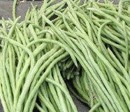 light green yardlong beans in a market